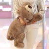 sg-11134201-7renh-m1pmvs6izlxbd8.webp Sleeping Bear Plush Toy